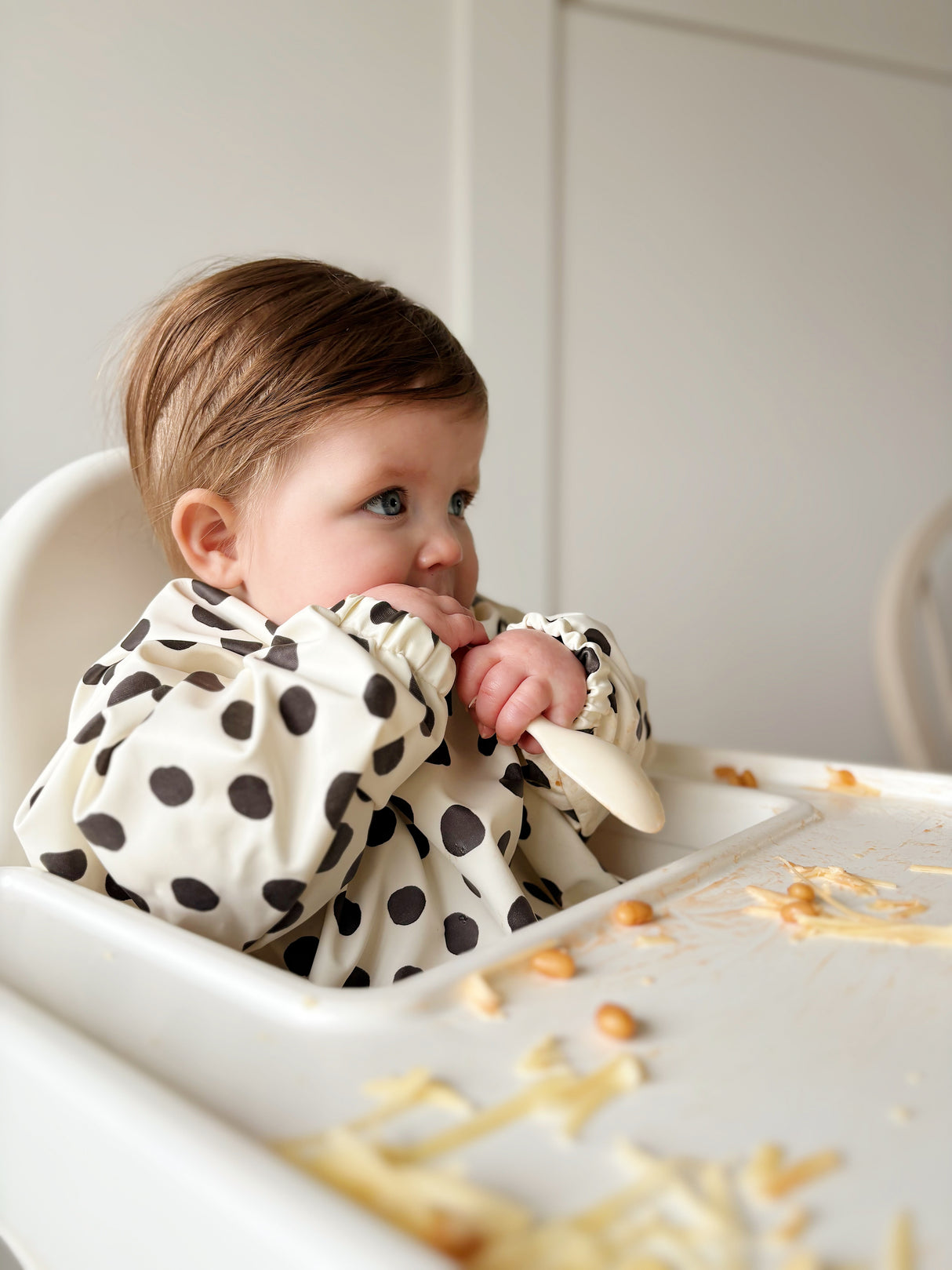 Long Sleeved Baby Bib - Spotty print