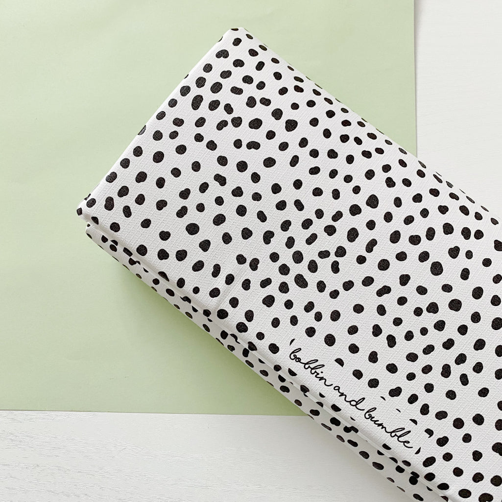 Folding Baby Changing Mat - Black Spotty Print | Bobbin and Bumble.