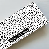 Folding Baby Changing Mat - Black Spotty Print | Bobbin and Bumble.