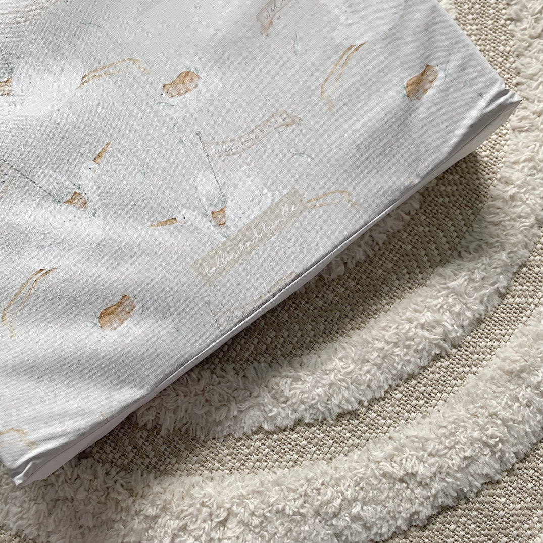 Anti-Roll Wedge Baby Changing Mat - Welcome Baby Print | Bobbin and Bumble.