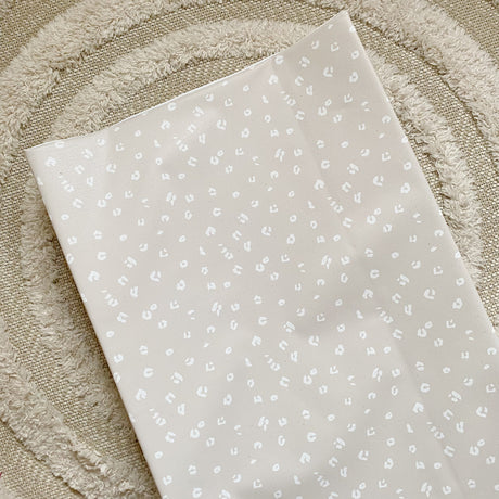 Anti-Roll Wedge Baby Changing Mat - Sand Animal Print | Bobbin and Bumble.