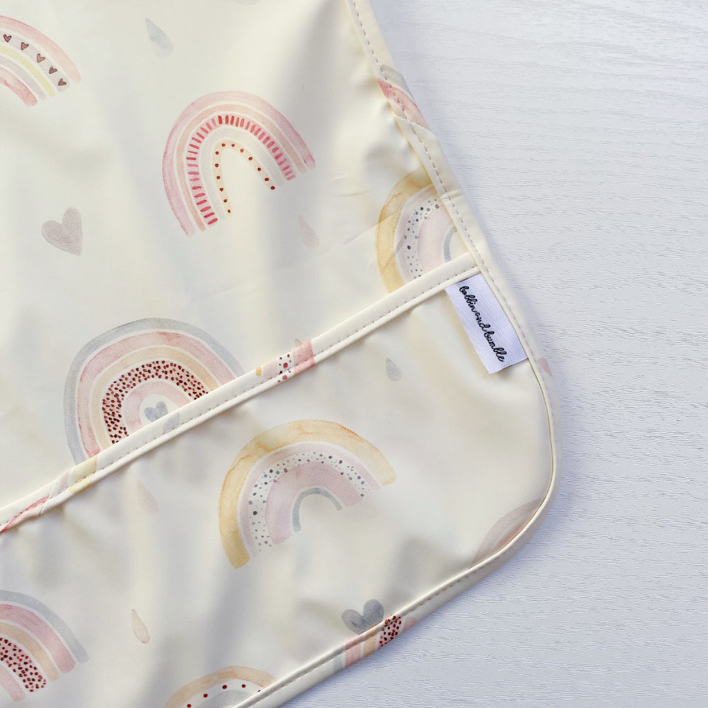 Long Sleeved Baby Bib - Rainbow print | Bobbin and Bumble.