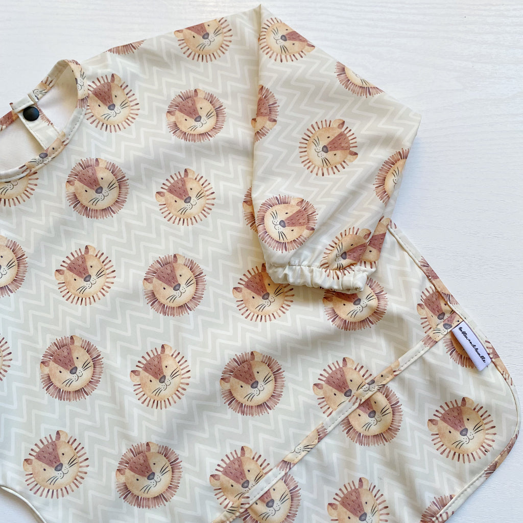 Long Sleeved Baby Bib - Leo Lion | Bobbin and Bumble.