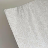 Anti-Roll Wedge Changing Mat - Delicate seashell print | Bobbin and Bumble.