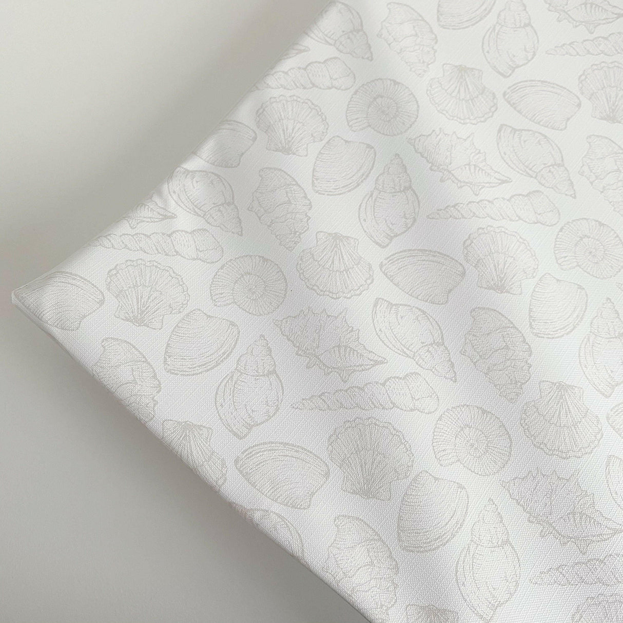 Anti-Roll Wedge Changing Mat - Delicate seashell print | Bobbin and Bumble.