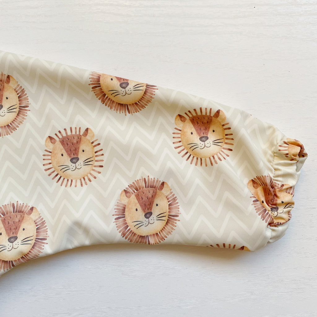 Long Sleeved Baby Bib - Leo Lion | Bobbin and Bumble.