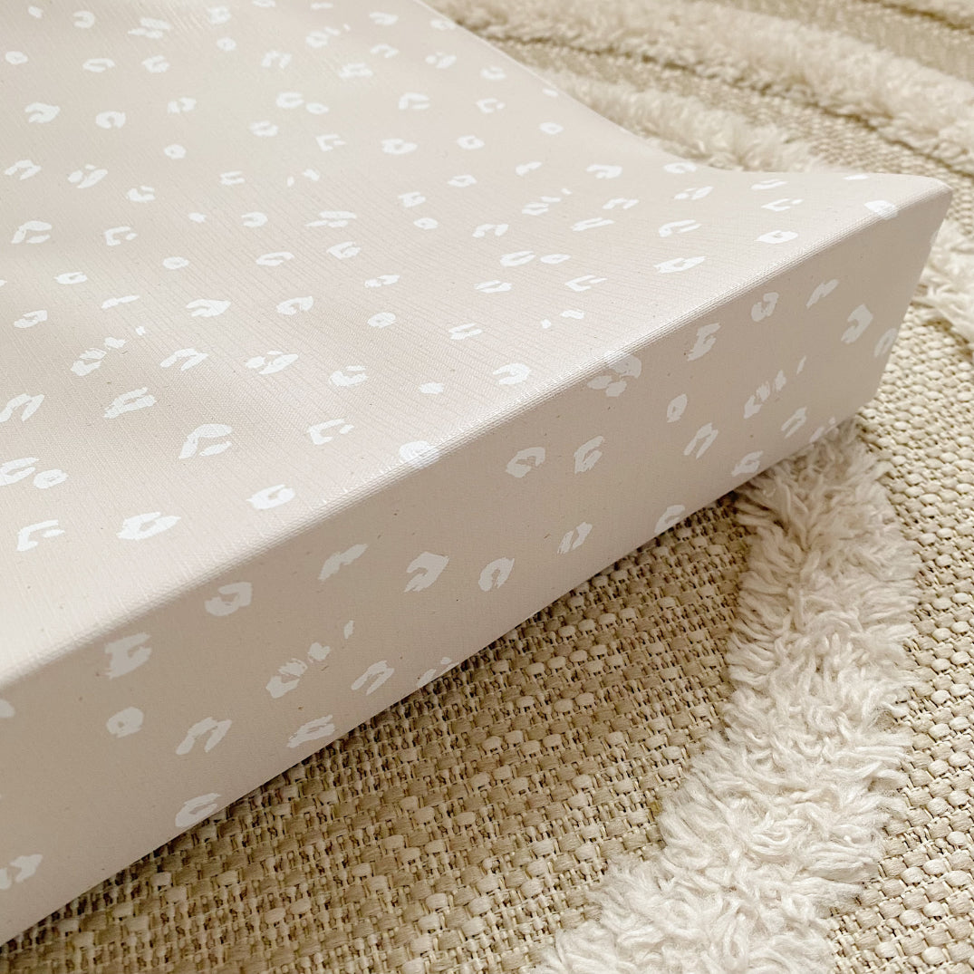 Anti-Roll Wedge Baby Changing Mat - Sand Animal Print | Bobbin and Bumble.