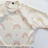 Long Sleeved Baby Bib - Rainbow print | Bobbin and Bumble.