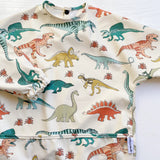 Long Sleeved Baby Bib - Dinosaur print | Bobbin and Bumble.