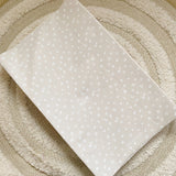 Anti-Roll Wedge Baby Changing Mat - Sand Animal Print | Bobbin and Bumble.